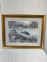 Full view of the framed fine art print showing the underwater lake scene with a perch fish and the gold frame around it.