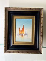 Full front view of the framed miniature watercolor painting depicting sailboats.