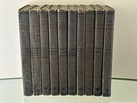Front view of all ten volumes in a row