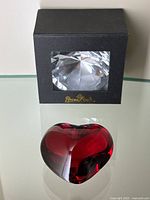 Both red Baccarat heart paperweight and boxed Rosenthal diamond paperweight