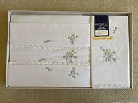 Folded top sheet and pillowcases in box with Redaelli label