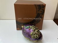 Front view of ornament in original Jay Strongwater box