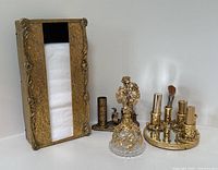 All four pieces arranged side by side: tissue box, nail polish holder, perfume bottle, lipstick holder on mirror tray