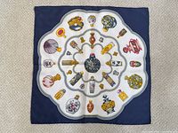 Full view of square scarf showing central and border design