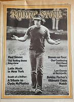 Cover photo of Paul Simon standing outdoors with arms open, date July 20, 1972, with titles of featured articles on the cover.