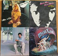 Front covers of four 1980s vinyl albums: Kim Carnes, Daryl Hall & John Oates, Lionel Richie, and Meat Loaf.