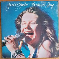 Front cover of the Janis Joplin Farewell Song album, showing a close-up photo of Janis Joplin singing, holding a microphone.