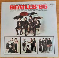Front cover of the Beatles '65 vinyl album showing band photos and song titles