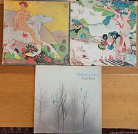 Photo showing three Fleetwood Mac vinyl albums with illustrated covers: Then Play On, Kiln House, and Bare Trees.