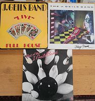 Front view of three J. Geils Band vinyl albums showing 'Full House Live', 'Freeze Frame', and 'The Best of J. Geils Band'.