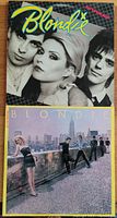 Front covers of two Blondie vinyl albums 'Eat to the Beat' (top) and 'AutoAmerican' (bottom).