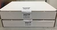 Two white boxes stacked, labeled Labeltown 26210 with size 2-5/8" x 1", 30 labels per sheet, 250 sheets per box