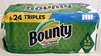 Photo of full package of Bounty paper towels showing packaging and branding indicating 8 rolls and 24 triple rolls.