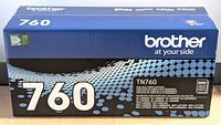 Front side of the blue Brother TN760 toner cartridge box with branding and model info.