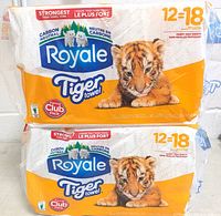 Two packages of Royale Tiger Towel paper towels stacked, showing front of packaging with tiger cub image and product details.