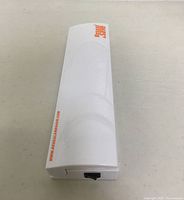 Top and side views of white and orange ABS plastic vacuum sealer, showing length measurement and branding details.