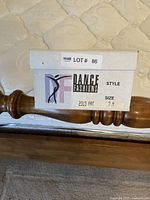 Box with label showing Dance Fashions branding, style number 2313 PAT, size 7M