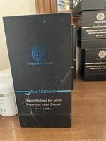 Black box labeled Forever Flawless Blue Diamond Diamond Infused Eye Serum 40 ml front view.