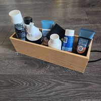 Wooden holder with all paint containers visible