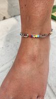 Anklet worn on ankle displaying fit and bead colours