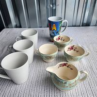 Group view of all eight pieces on surface