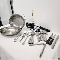 Group shot of entire lot including bowls, cutlery and utensils