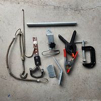 Full lot overview showing clamps, springs and brackets