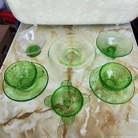 All eight uranium glass pieces laid out