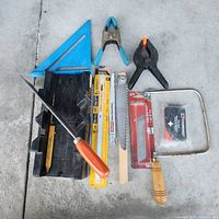 All items laid out on concrete surface
