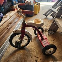 Full side view of tricycle showing overall condition