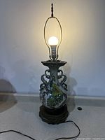 Full lamp lit and standing, showing overall height and working status.