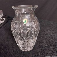 Front view of the clear crystal vase showing the Greek cut pattern and the Made in Hungary label.
