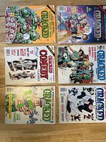 Front covers of all six Cracked magazines showing diverse parody and satire themes from 1990s era.