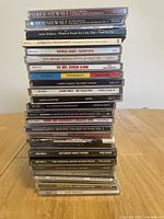 Photo showing the stack of spines with various album titles and artists.