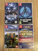 Front of all four Nintendo Switch game cases: Huntdown, Killer Queen Black, Minecraft, and Wheel of Fortune & Jeopardy.