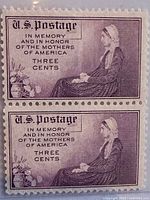 Close-up of block of two 1934 U.S. Mothers Day 3 cent stamps, showing detailed imagery and text.