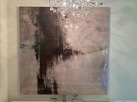 Front view of large square abstract painting showing color and design details.