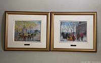 Pair of framed paintings showing both artworks together, gold frames with white mats