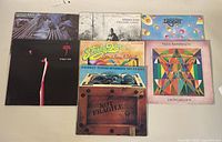 Overview photo showing all 7 vinyl record albums with their jackets including Steely Dan, Bachman Turner Overdrive, Todd Rundgren and others.