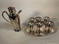 Full set including the 12 inch drink mixer, 14 inch tray, and six goblets arranged on the tray.