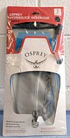 Front view of Osprey Hydraulics 2-litre reservoir in original packaging showing the clear reservoir with Osprey logo and product details.