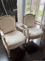 Pair of chairs front view showing seats and backs