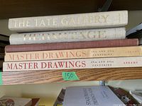 Five hardcover art books stacked horizontally showing titles on spines including 'The Tate Gallery', 'The Hermitage', and two volumes of 'Master Drawings 19th and 20th Centuries'.