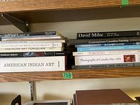 Shelf view showing various art books about American Indian art and other American art.