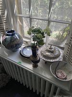 Wide view on windowsill showing all six items together