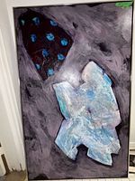 Front view of abstract painting showing entire image with black dotted shape and white-blue form