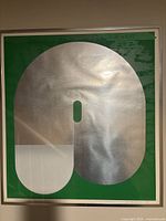 Front view of framed abstract geometric wall art