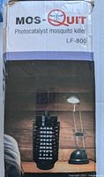 Front image of Mos-Quit Photocatalyst mosquito killer LF-800 box showing the device in an outdoor setting.