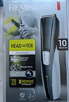 Front side of the Remington grooming kit box showing product and key features.