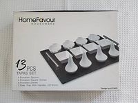 Photo of the boxed 13-piece tapas set from HomeFavour Houseware showing all included pieces and packaging.